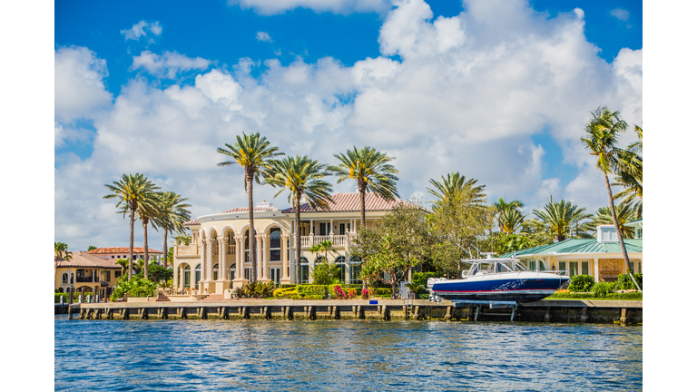 Yacht at Coastal Mansion