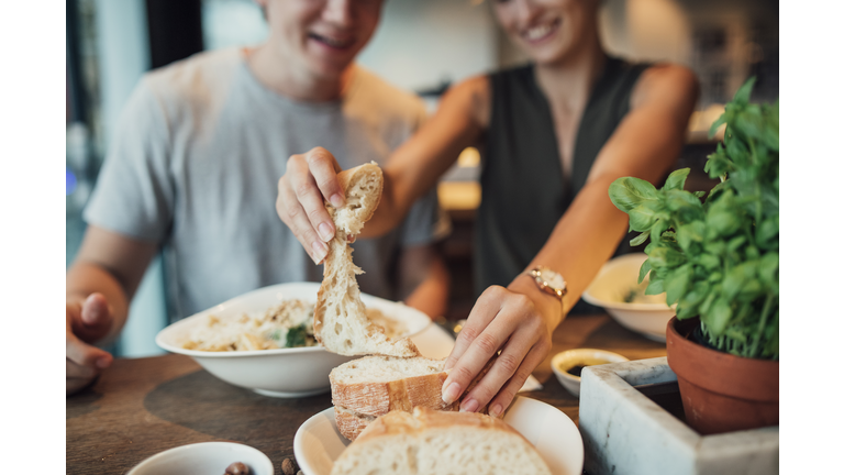 Eating Bread in a Restaurant