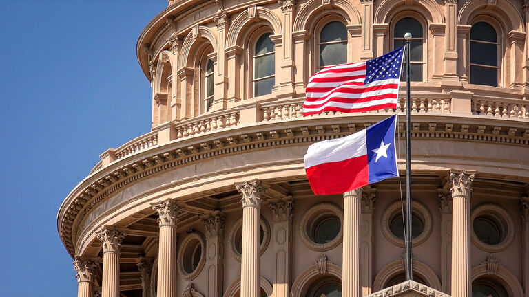 American and Texas Flag Flying, Texas State Capitol in Austin