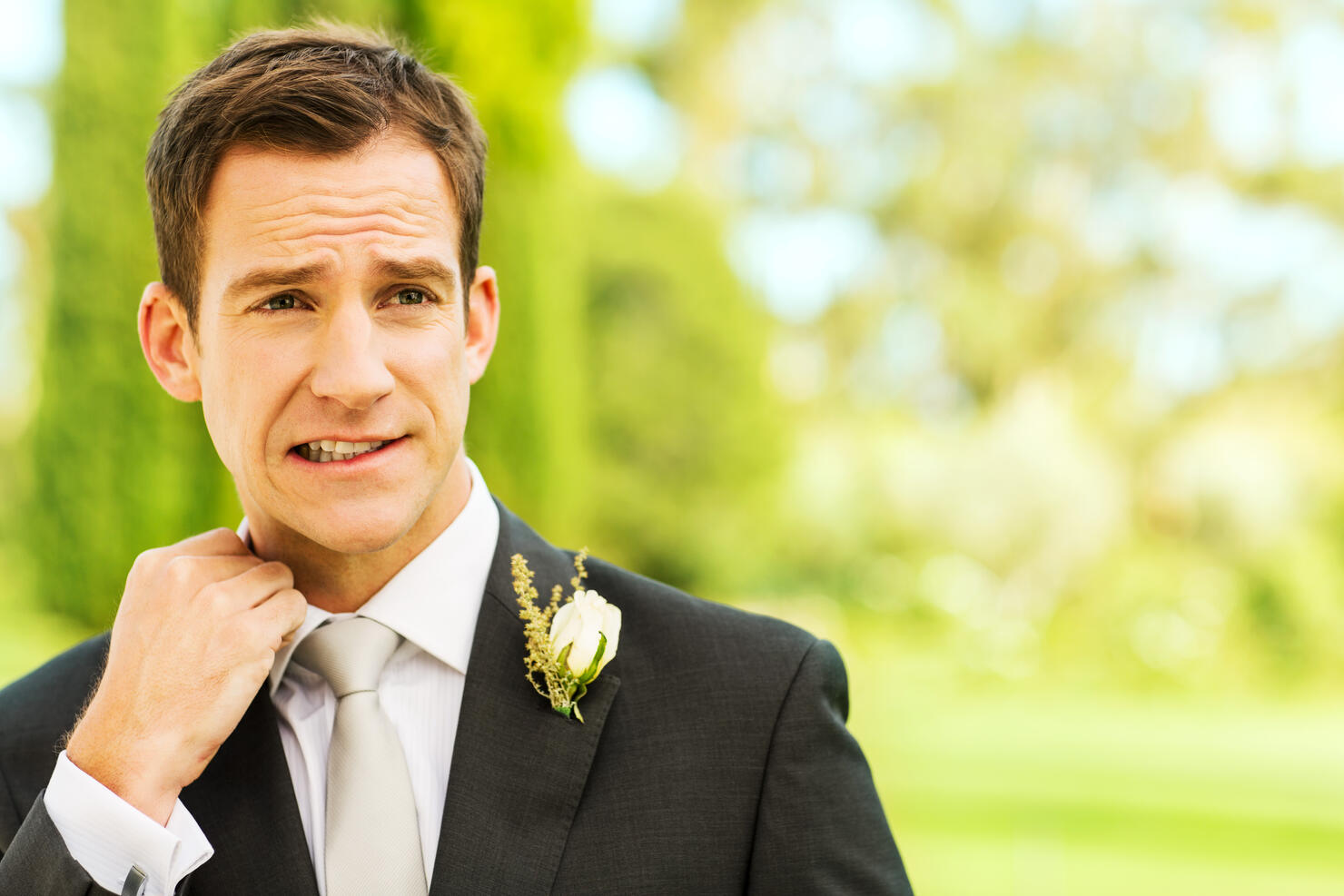 Nervous Groom In Garden