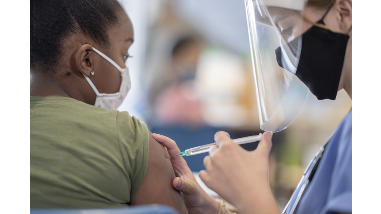 Student getting vaccinated