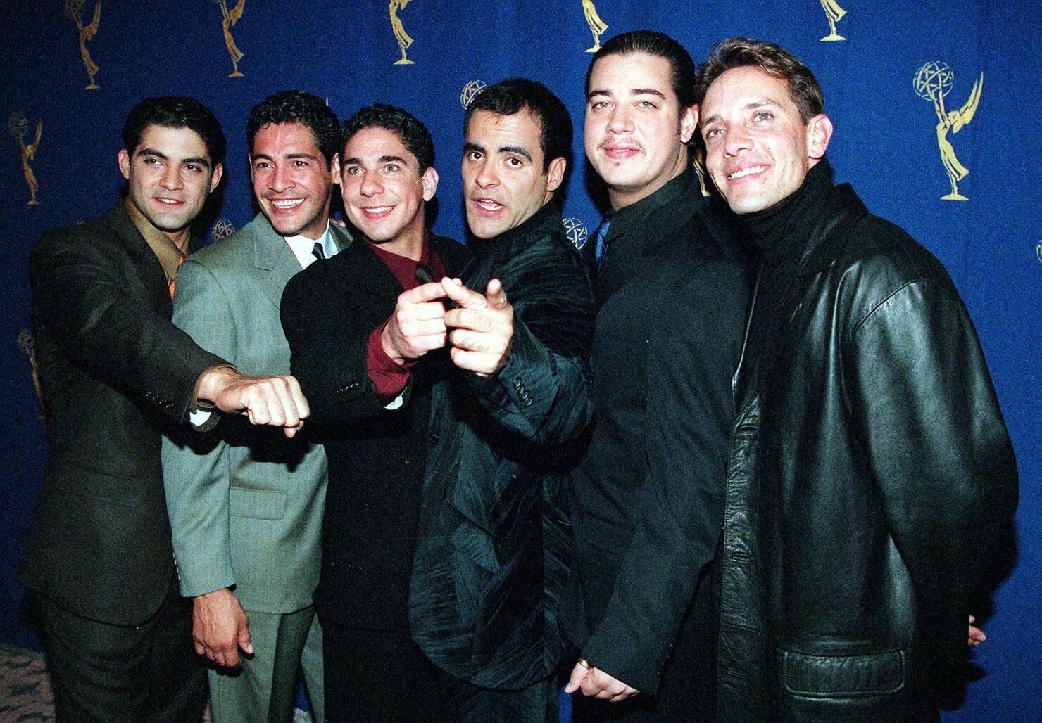 Members of the musical group Meneudo pose for phot