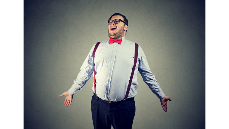 Eccentric chunky man singing opera