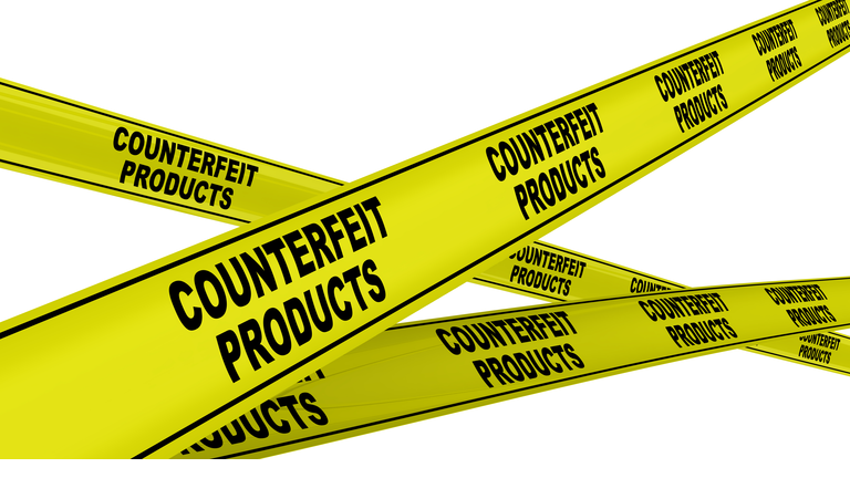 Counterfeit products. Yellow warning tapes