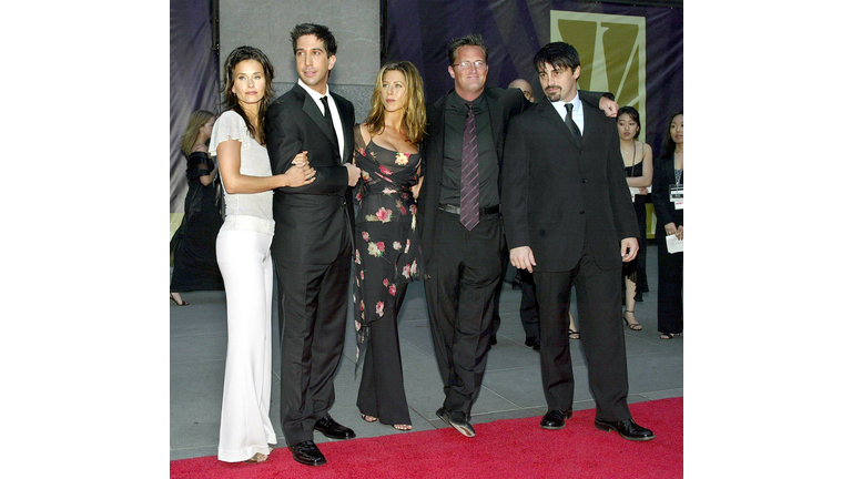 Five of the six cast members of the show "Friends"