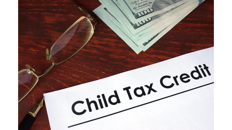 Child tax credit written on a paper. Financial concept.