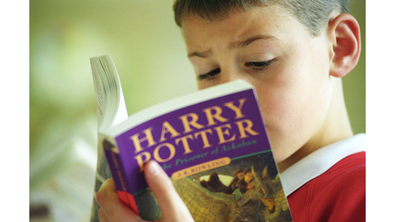 Boy Reading Harry Potter