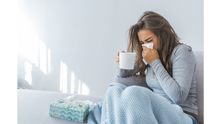 Portrait Of Ill Woman Caught Cold