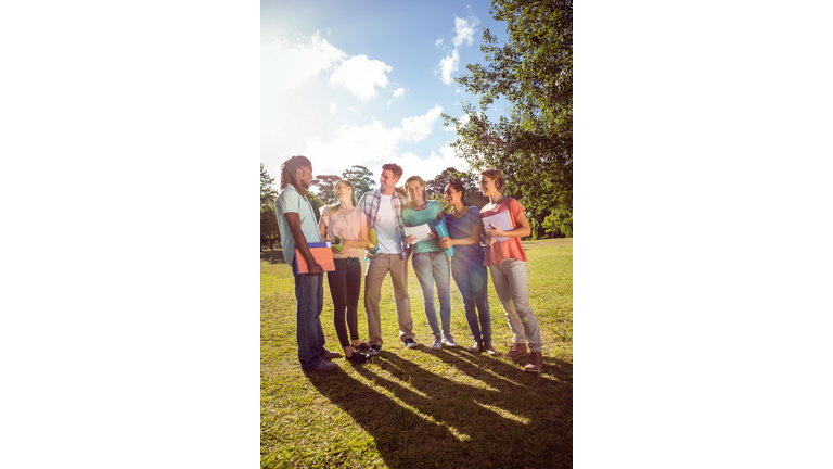 Happy students outside on campus