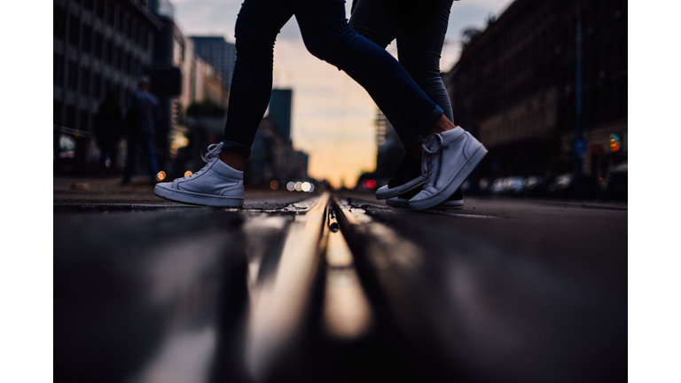 Low Section Of People Walking On Street City