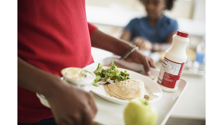 Black students eating lunch in school cafeteria