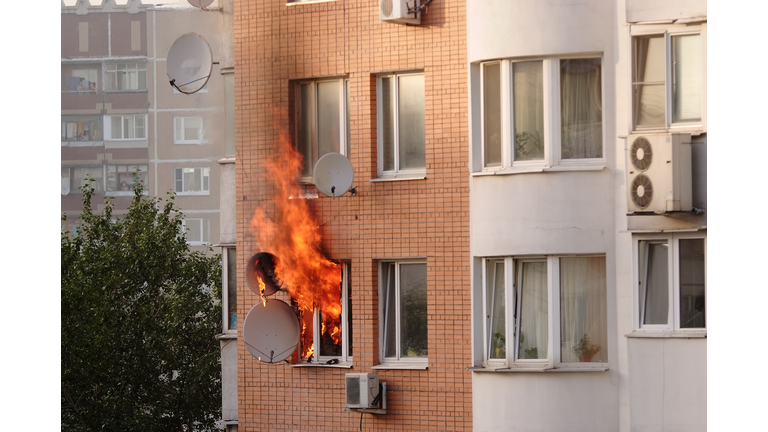 Apartment building engulfed in flames