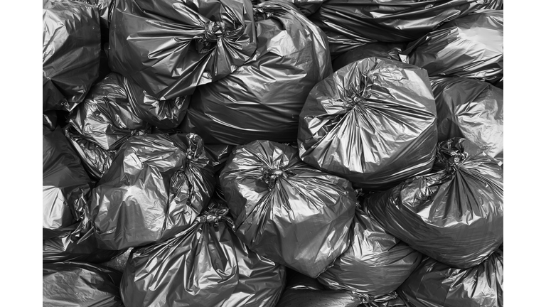 A pile of black garbage bags.