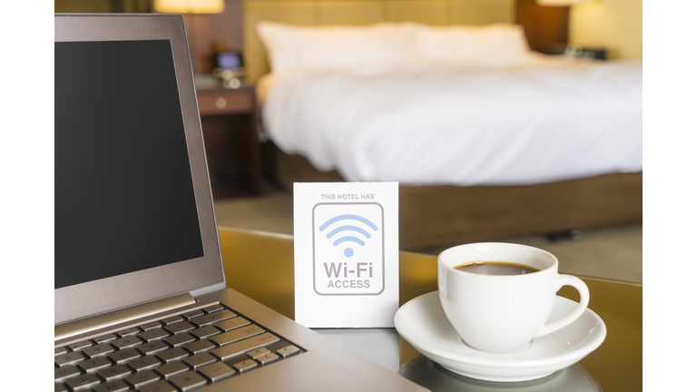 Hotel room with wifi access sign