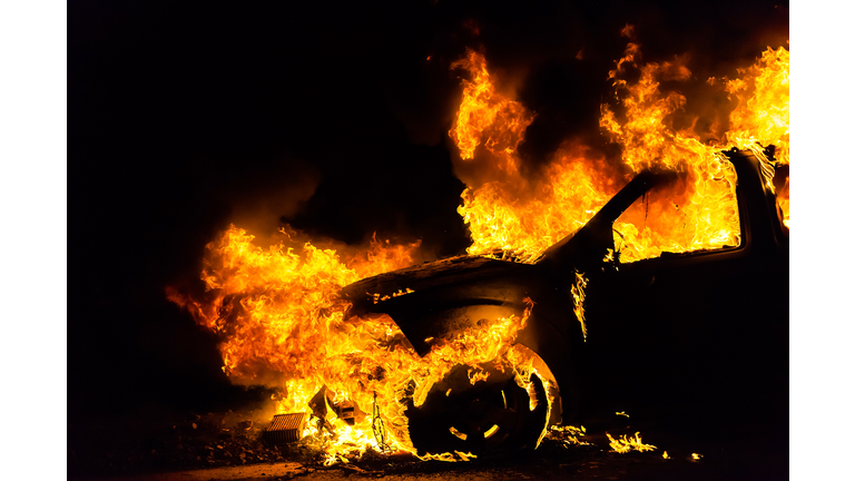 Car in fire, burning