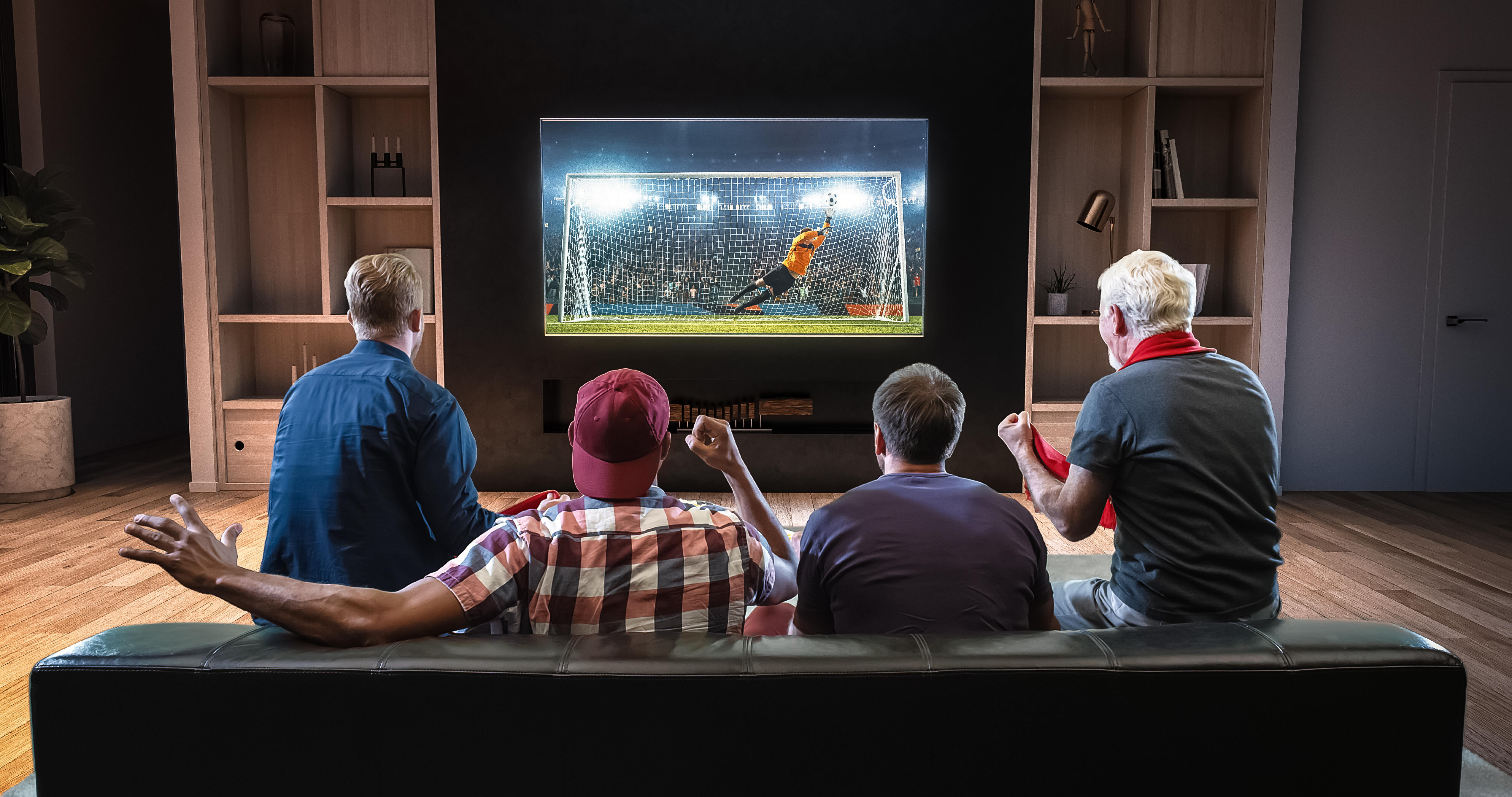They to watch a new. Футбол по телевизору. Болельщики у телевизора. Человек перед телевизором. Люди смотрят футбол по телевизору.