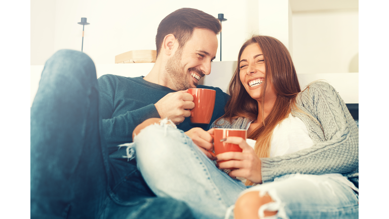 Happy young couple at home