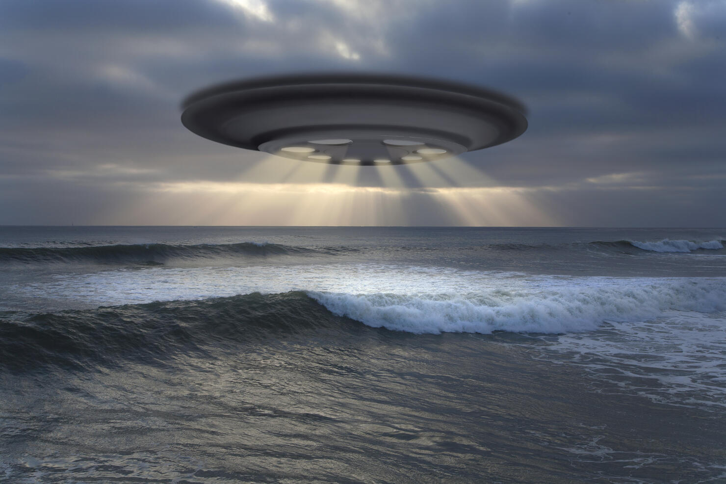 View of the flying saucer (UFO) over the ocean.