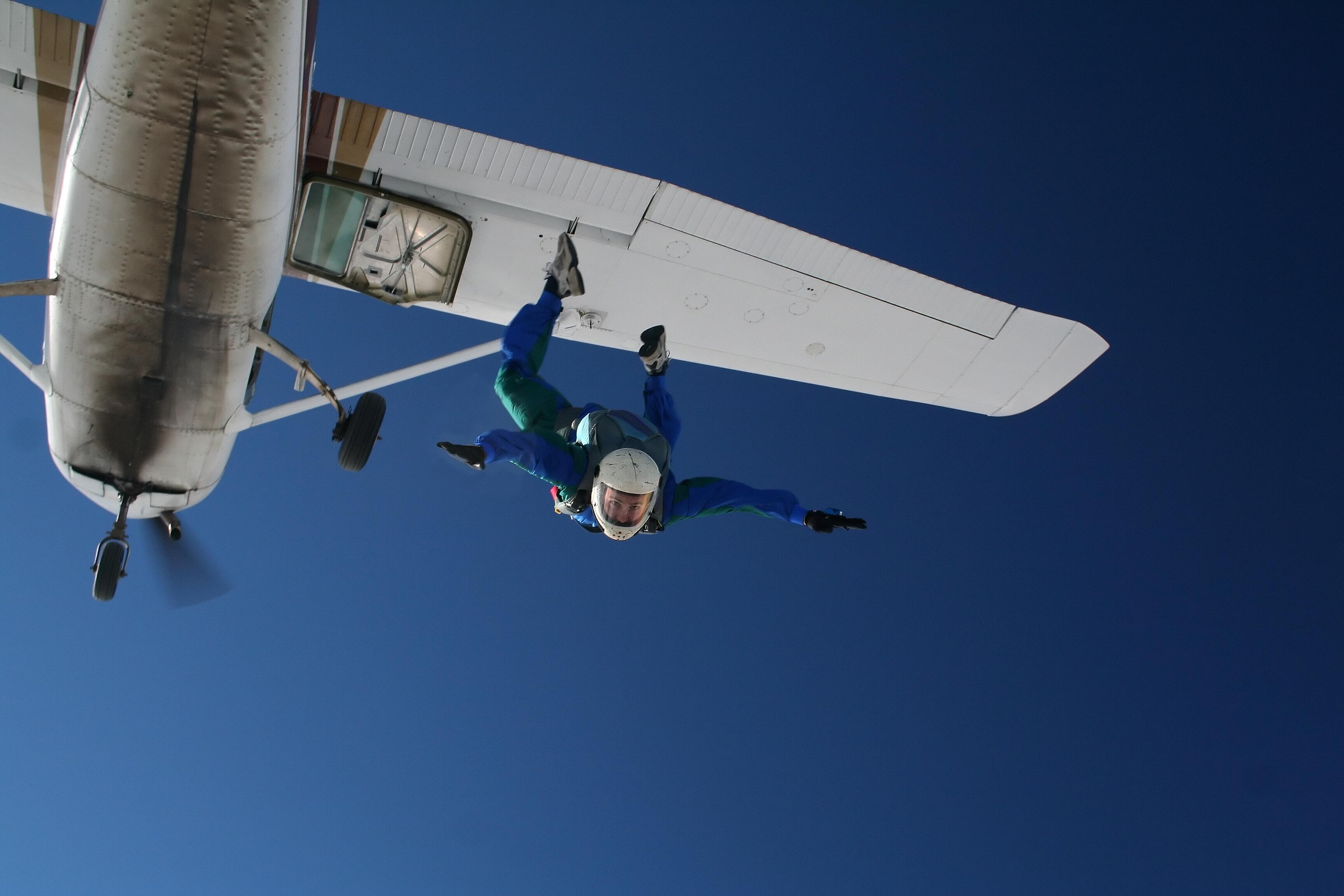 Skydiver Flies Right Next To A Plane! - Thumbnail Image