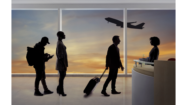 Silhouettes of Passengers in Line at Airport