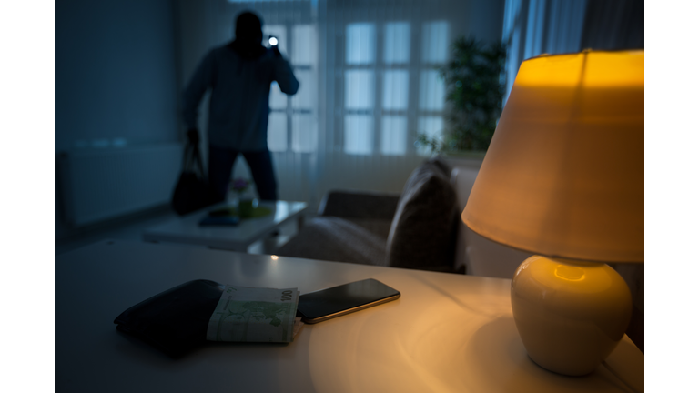 burglar in a house inhabited