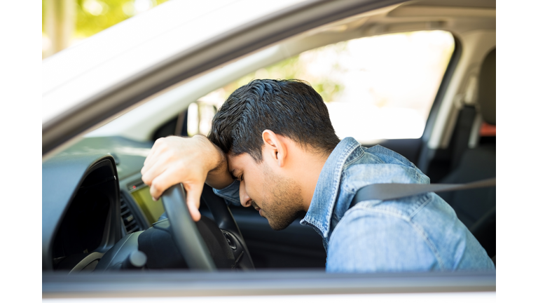 Man stuck in traffic jam