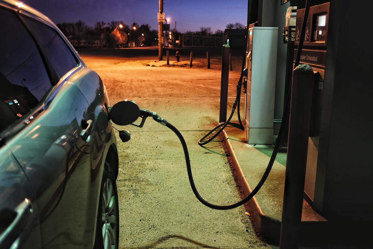 Car Refueling In Gas Station At Night
