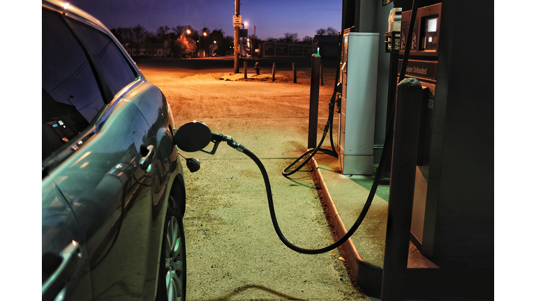 Car Refueling In Gas Station At Night