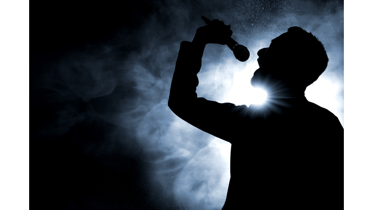 Singer singing silhouette