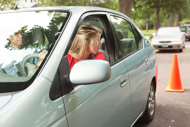 Teen Driver Learning Parallel Parking with Driving Instructor and Cone