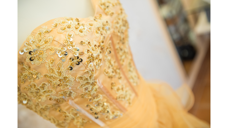 Orange and gold dress detail
