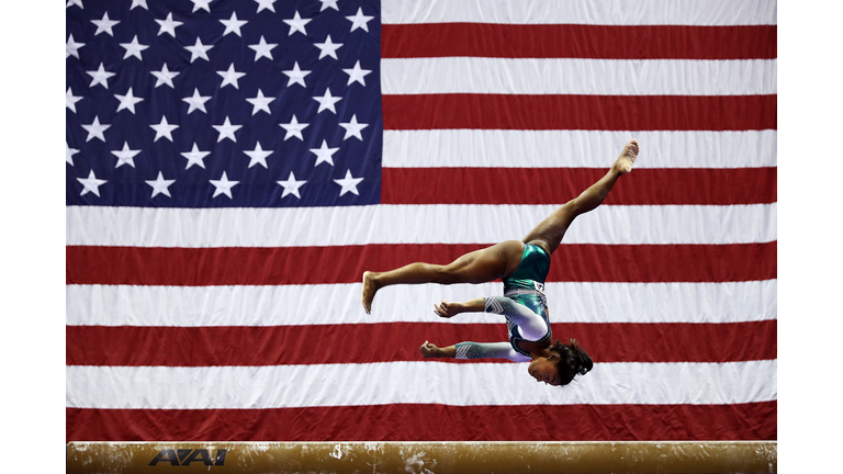 Simone Biles competes on the balance beam 