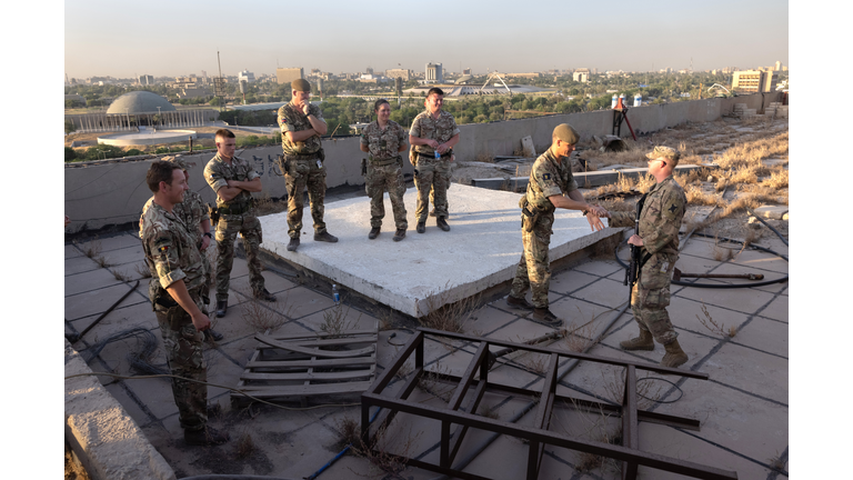 Coalition And Iraqi Forces Occupy Baghdad's International Zone