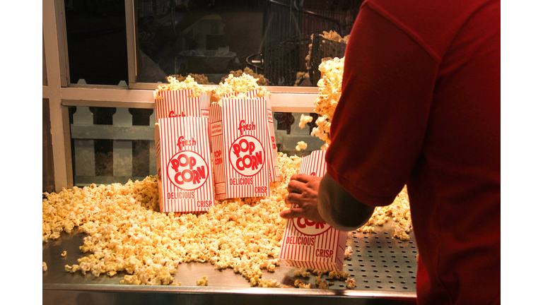 Popcorn vendor inside a concession stand