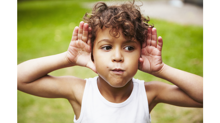 Boy (4-5) making faces