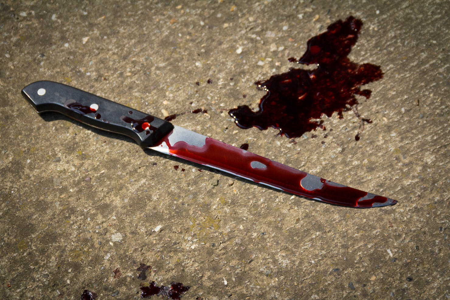 Bloody knife on the floor