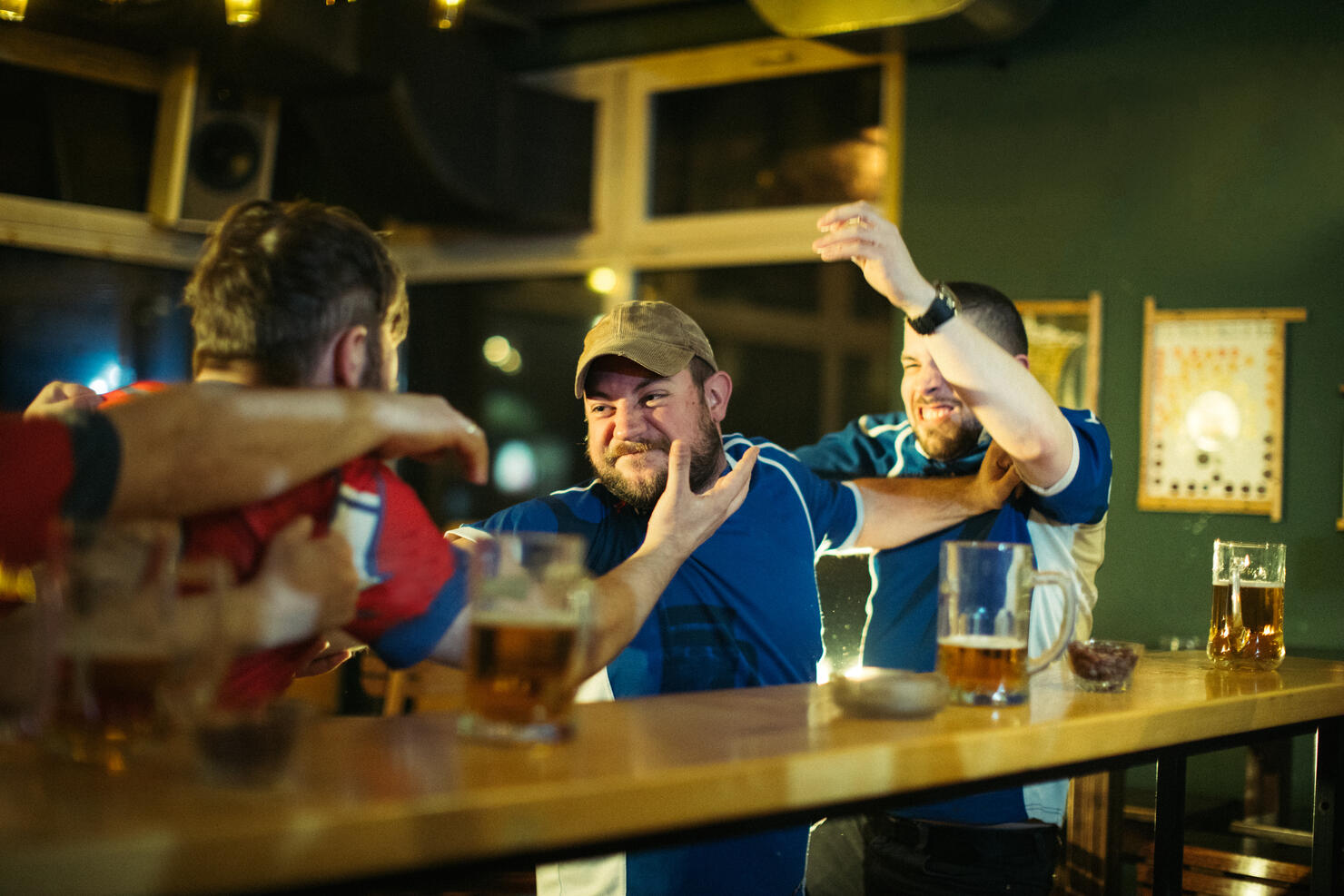 Men fighting in pub