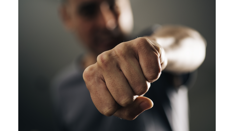 young man throwing a punch