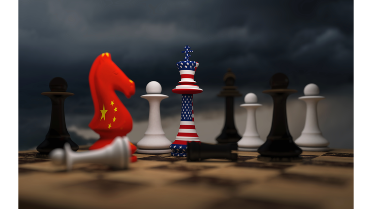 USA and China trade relations, cooperation strategy. US America and China flags on chess king on a chessboard.