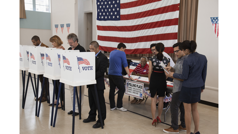 People voting in polling place