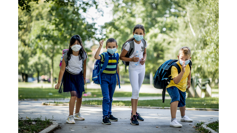 Children going back to school after epidemic, They are wearing a protective face mask