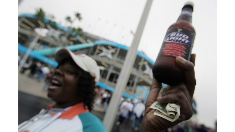 A beer vendor waitsg for customers 04 Fe...