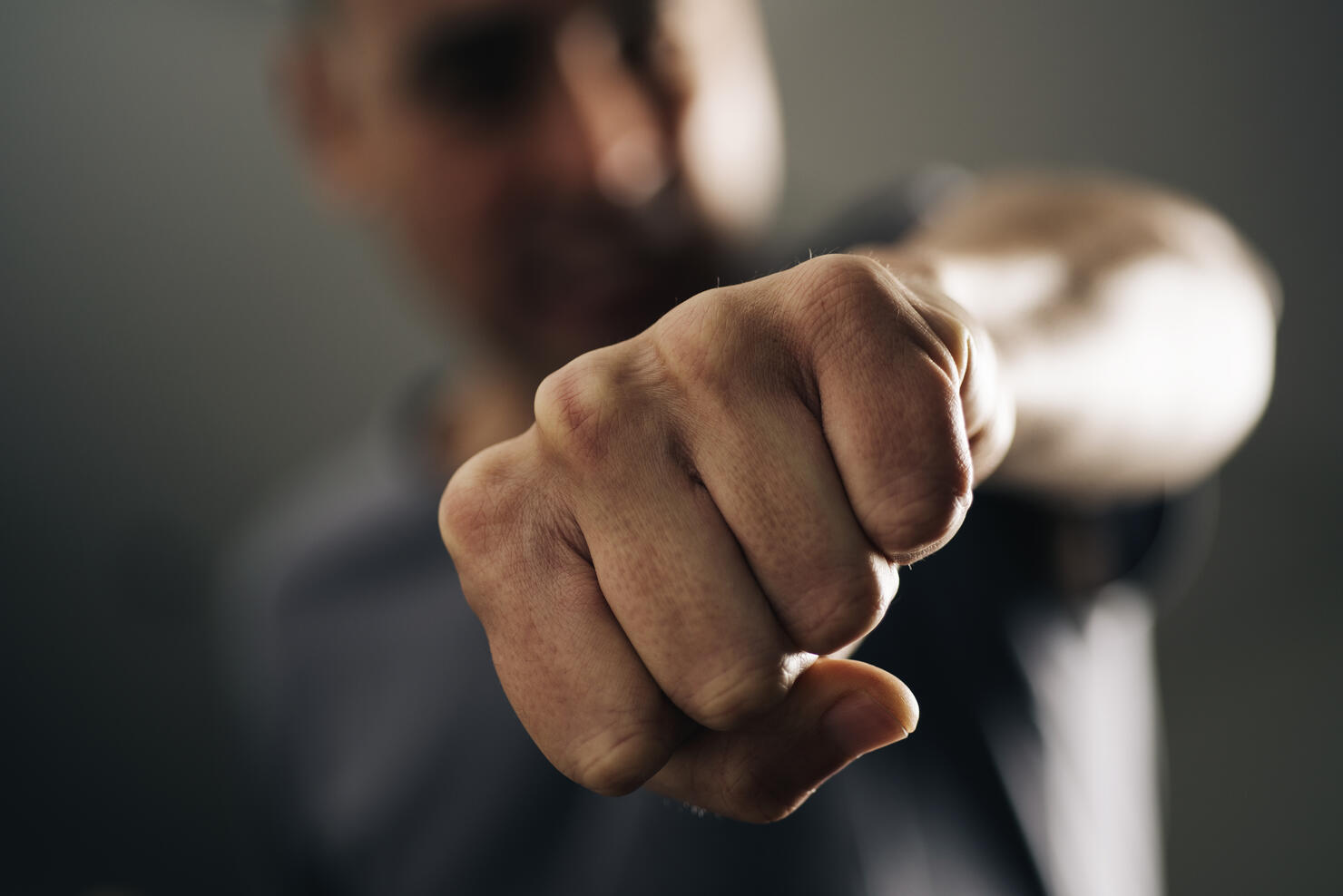 young man throwing a punch