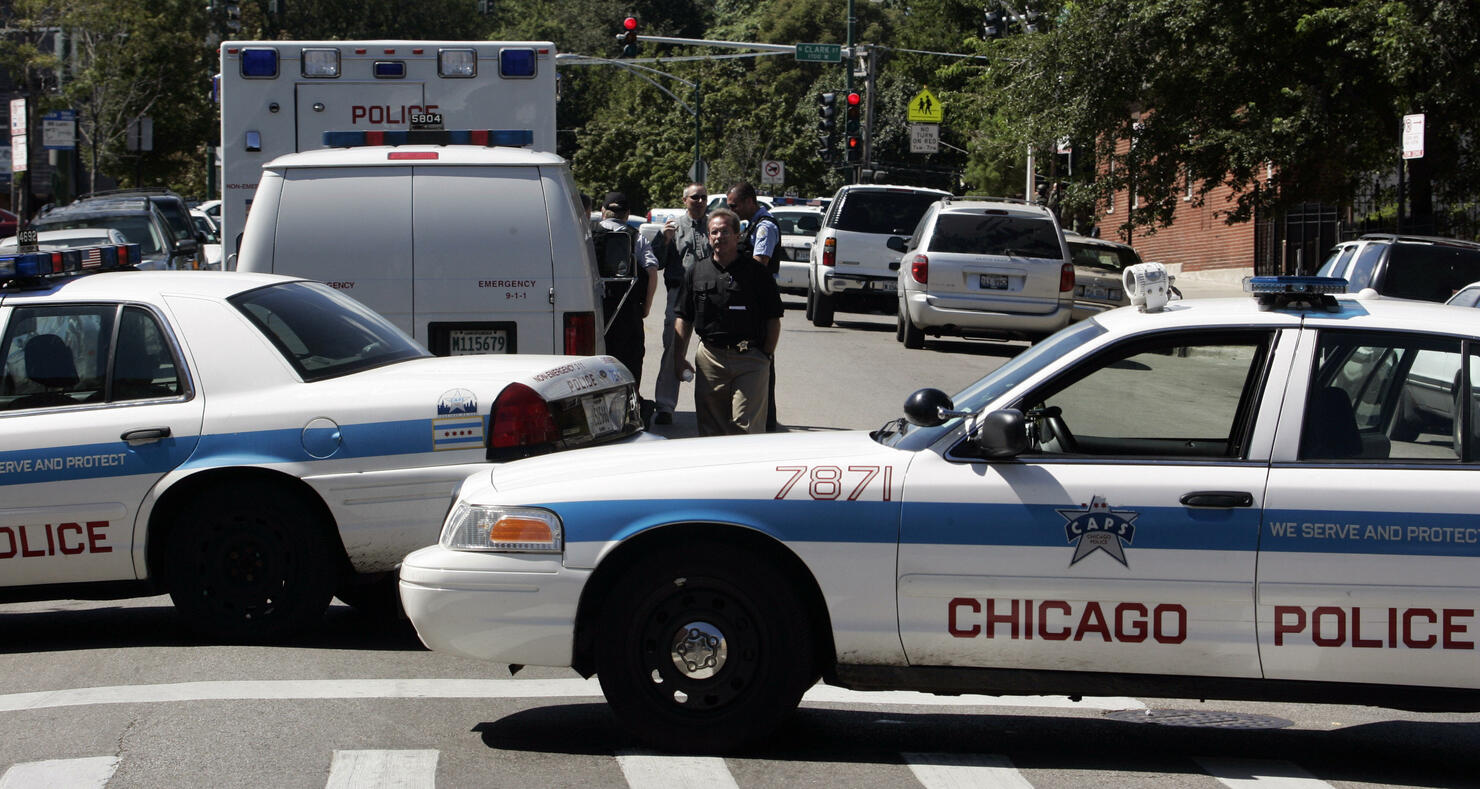 Chicago police block a street during a s