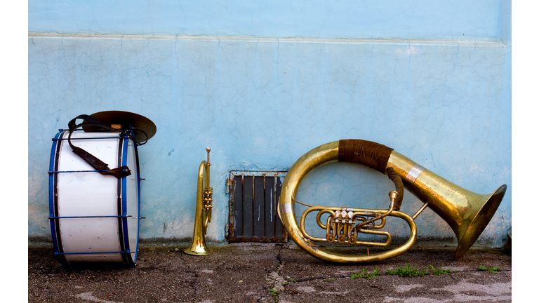 Brass instruments left on the street during a break