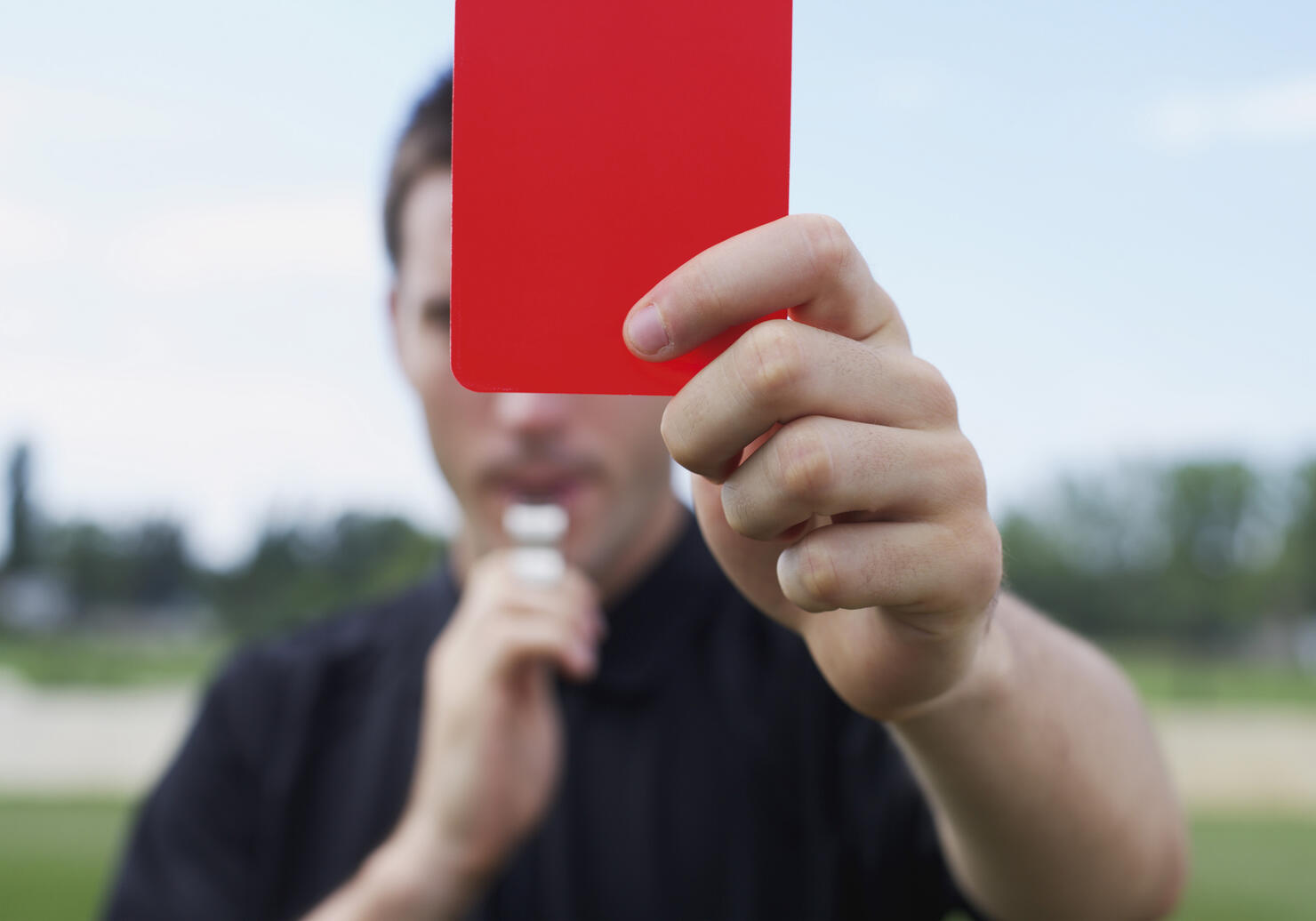 Referee showing red card