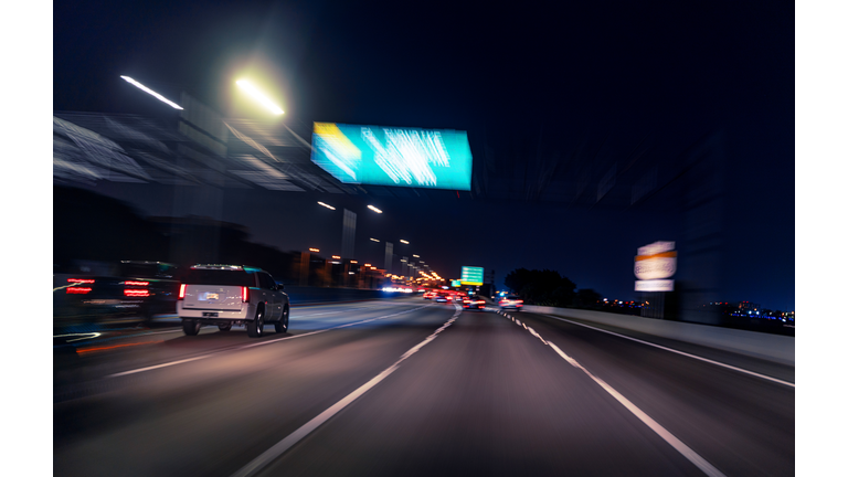 SUV at night in the Miami Palmetto highway