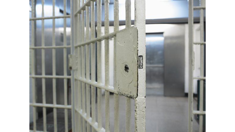 Open door to prison cell