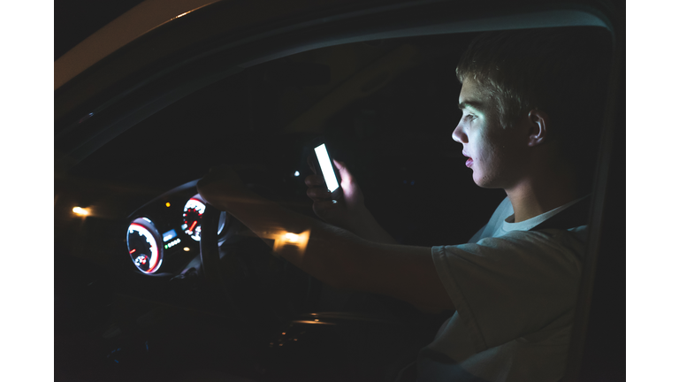 Distracted teenage driver.