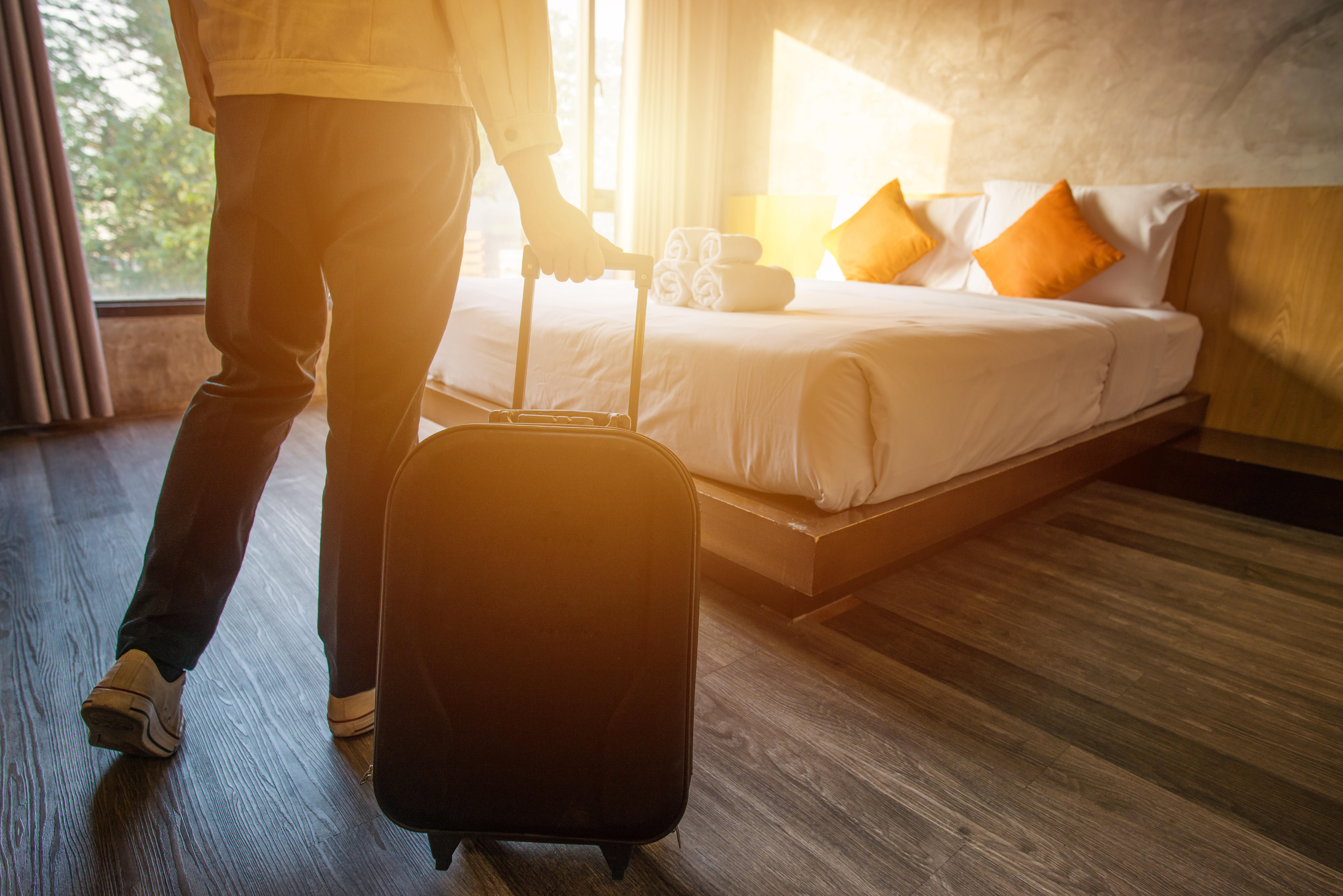 Stay at your house. Luggage in Hotel Room. Checking into a Hotel. Hotel Room Travel. Hotel booking.